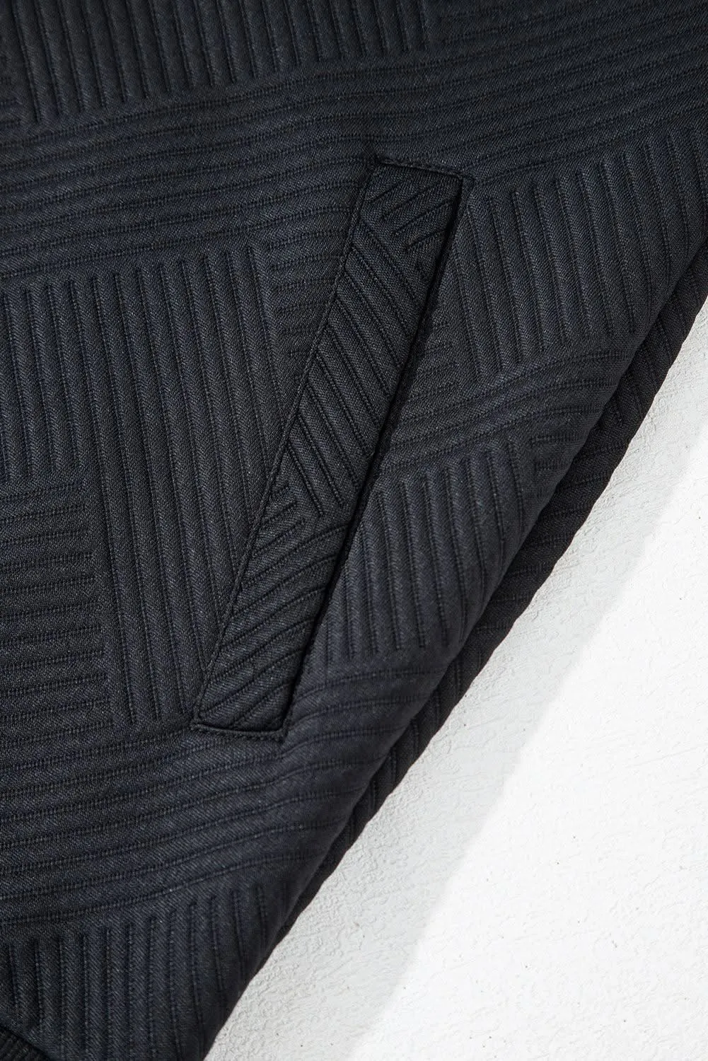 Sleek black bomber jacket with stand neck